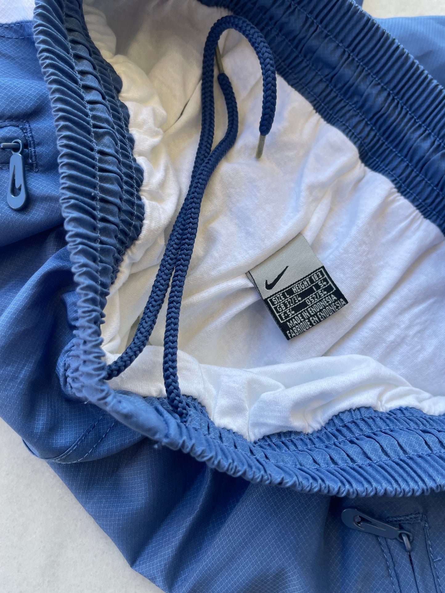 NIKE 00s LIGHT BLUE TRACKPANTS